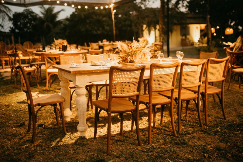 Brightly lit tables on a patio - Shop C2CLights.com.